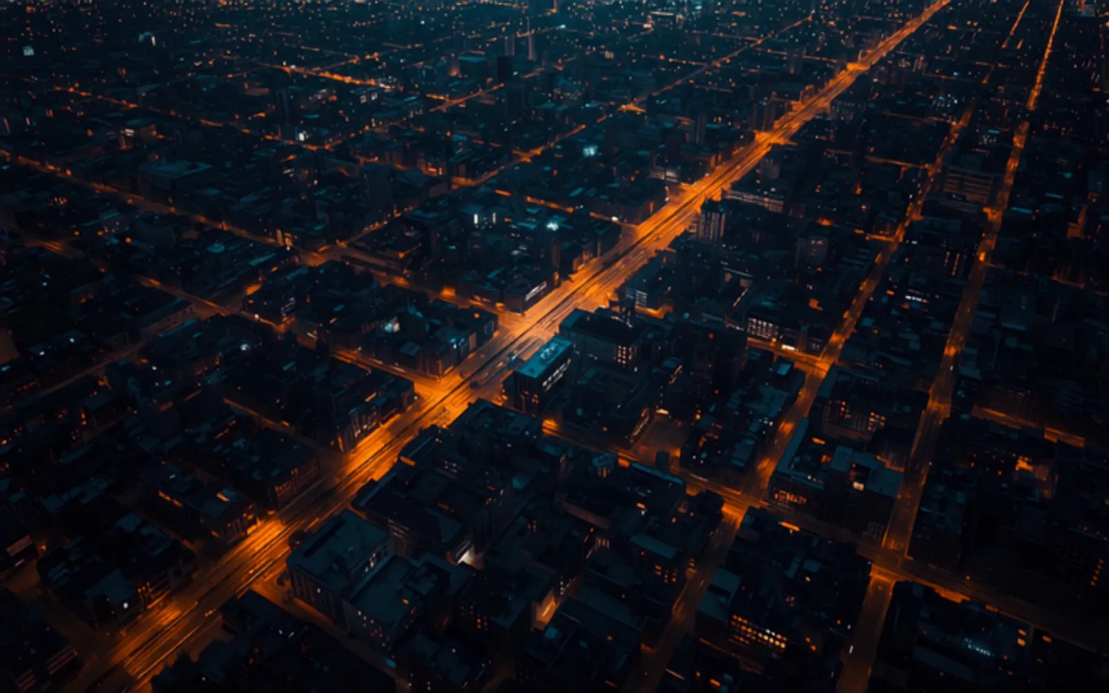Aerial city grid of connected lights at night